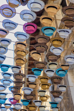 Hats In Avignon Over A Street