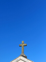 Cross placed on buildings or cemeteries