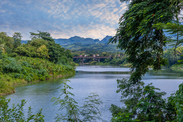 Fototapeta premium Luang Prabang Laos surrounded by the high mountains and the Mekong River. This lovely city is nestled in the high mountains and tropical rainforest