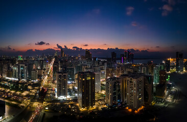 Obraz premium Aerial view on Abu Dhabi cityscape after the sunset