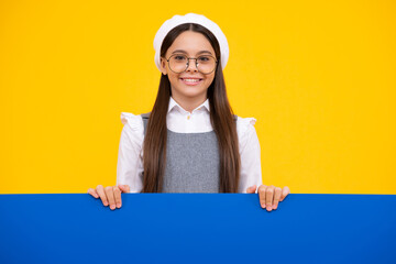 Teenage girl holds a blank for notification informing. Advertisement and sale. Markets and shops...