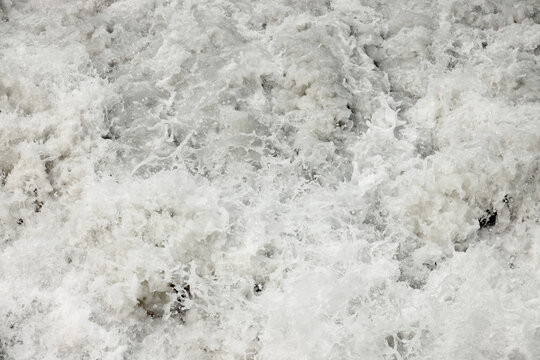 Raging Muddy Water Of A Mountain River