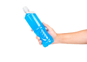 Plastic bottle with blue isotonic drink in male hand isolated on white background