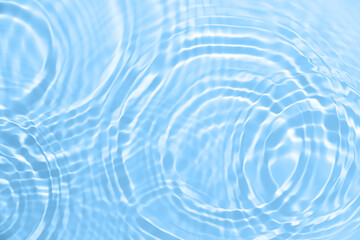 Fresh water background. Blue abstract pattern with clear rippled water texture. Top view