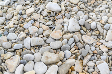 Stones on the sea. Texture of stones. Pebbles by the water. Rest on the sea.