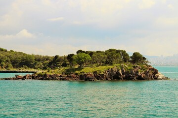 Fototapeta premium Island with steep shores in the marble sea