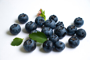 Fresh blueberries on a light background