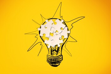 Light bulb from puzzles on background. Inspiration and creative idea concept.