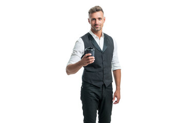 Happy professional man in suit vest holding disposable cup with takeaway coffee isolated on white