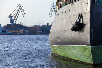 Black hull with an anchor of vintage icebreaker ship