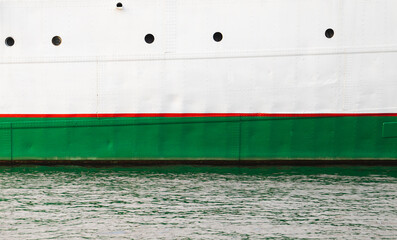 Vintage white ship hull with red green waterline