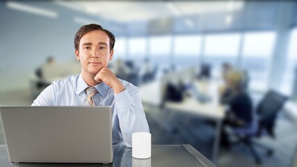 Businessman Working on Computer in Office. Successful IT Software Engineer Working on a Laptop.