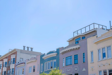 Exterior of houses with decorative trims against the sky at the back in San Francisco, CA