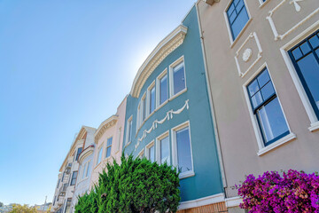 Decorative trims on the colorful walls of residential buildings at San Francisco, CA
