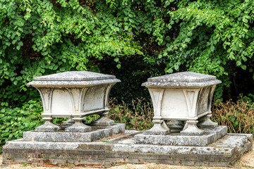 Fototapeta na wymiar Two Raised Syone Tombs In A Church Graveyard Or Cemetery