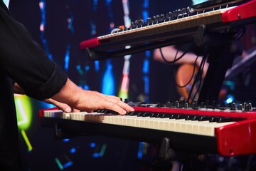 Electronic keyboard musical instrument synthesizer. Close-up of black and white keys. The concept of culture and art.