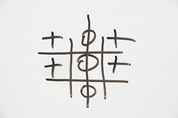 Tic Tac Toe is drawn in black on white, the Tic Tac Toe game