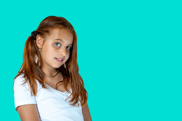 Young girl teenager isolated on colored background. Preparation for school concept. Girl kid gets ready for school. Schoolgirl holding many school books. Back to school concept.