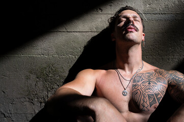A man is relaxing after a hard workout