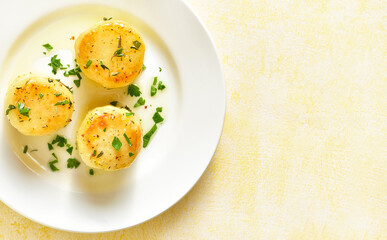 Fondant potatoes on plate