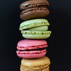 colorful macaroons on wooden table
