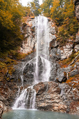 Fototapeta na wymiar Picturesque fall scenic landscape, autumn waterfall in Georgia Ajara, natural background with selective focus