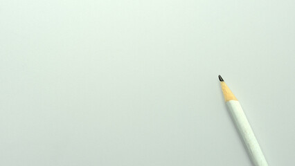 Pencil on a white background and place for text. Writing text. The concept of study, work. copy space.