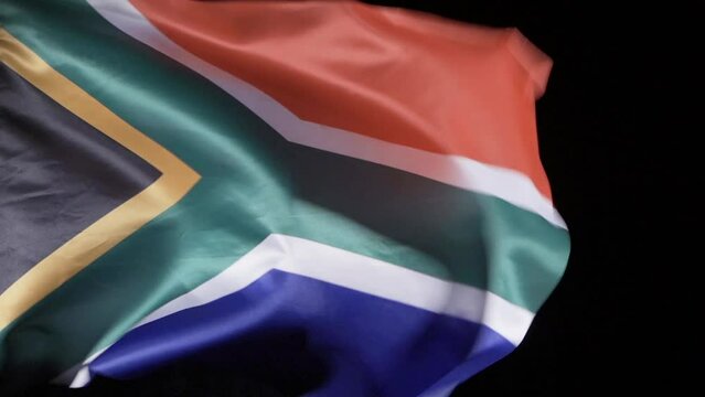 National Flag of the Republic of South Africa. It ripples in slow motion.
Flag of the Republic of South Africa waving in slow motion. Black background.
