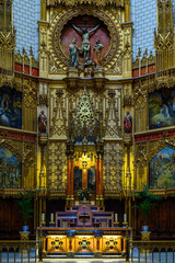Fototapeta na wymiar Altar in the colonial Church of the Holy Cross or Santa Cruz Parish, Madrid, Spain