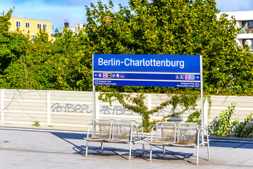 Berlin-Charlottenburg stop sign ot the platform of S-Bahn railway station in Charlottenburg district of Berlin. Station is located on Stadtbahn line (S3, S5, S7, S9) - obrazy, fototapety, plakaty