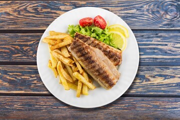Tasty fresh fish in a restaurant for family dinner.