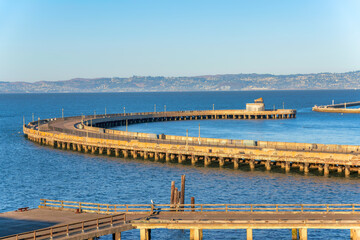 Fototapeta na wymiar Curved pier at Fisherman's Wharf at San Francisco, California