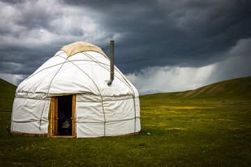 dramatic sky in the mountains, yurt camp, near song-köl lake, kyrgyzstan, central asia, hail storm