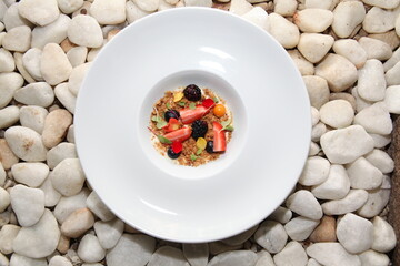 Crumble and berries dessert top view close up