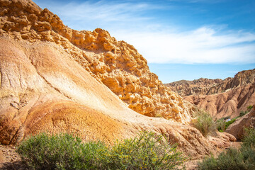 Fototapeta premium Fairytale canyon, Kyrgyzstan, Silk Road, Central Asia, red rocks, colourful