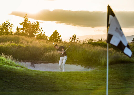 Golfer Hits From Sand Trap
