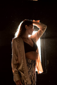 girl posing under the sunlight