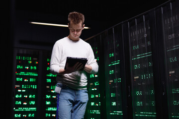 IT specialist controlling security of database 