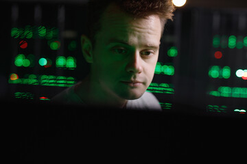 Systems analyst concentrating on work with database 