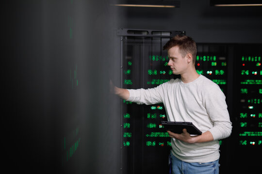 Programmer making diagnostics of database software 