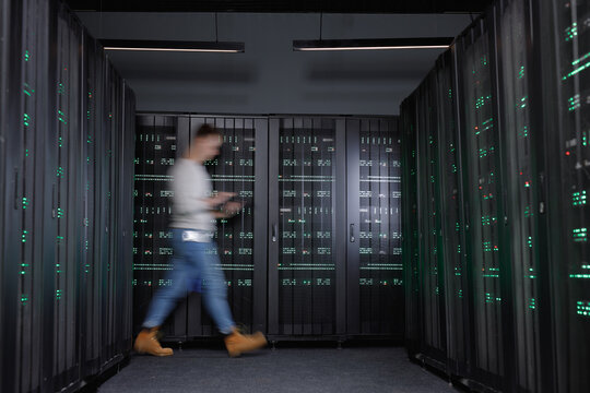 Busy worker spending time in data centre 
