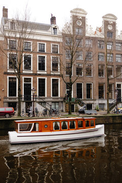 Boat crossing Amstel river 