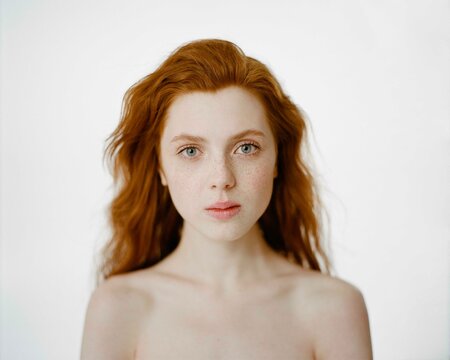European lady looking at camera with calm face
