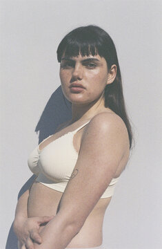 Sunny film portrait of serious woman
