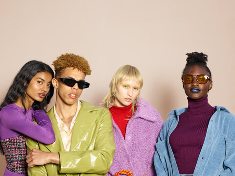 Confident, fashionable young people party outfits