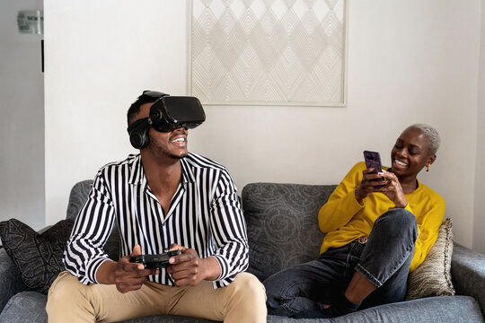 Black woman shooting boyfriend in VR helmet