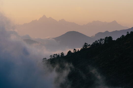 Fototapeta Shot of high mountains during sunset