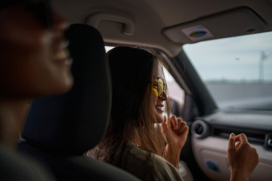 Friends enjoying road trip together