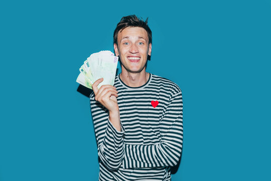 Happy Man Holding Money 