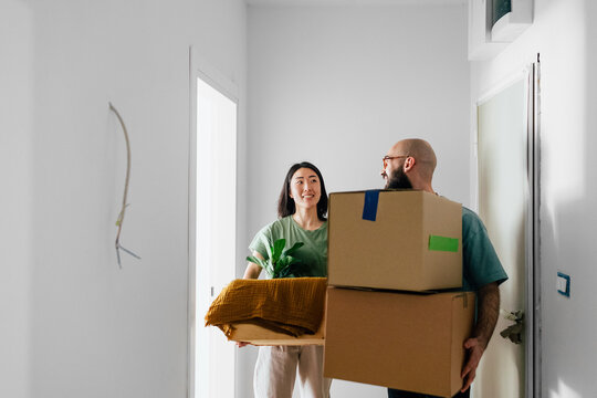 Mixed Race Couple Moving Into New Apartment